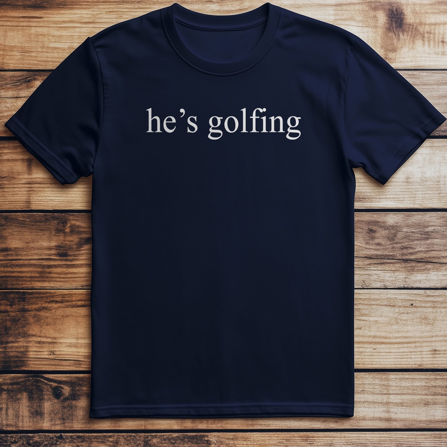 He's Golfing: T-Shirt